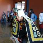 A member of the Geisan Dancers from Haines dances into the Jilkaat Kwaan Cultural Heritage and Bald Eagle Preserve Visitor Center at its grand opening on Saturday, May 14.