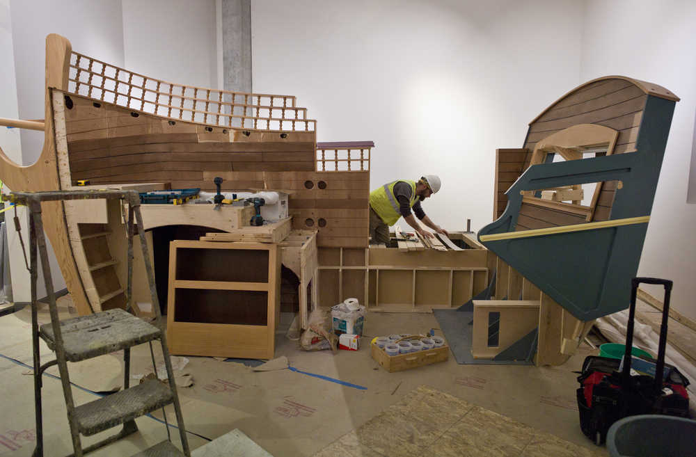 Shaun Davies of Spitrock Studios builds a new Discovery Ship in the Alaska State Library, Archives, and Museums building.