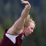 Ketchikan senior Brian McClennan competes in the shot put during the Region V Track and Field Championships at Thunder Mountain High School on Friday.