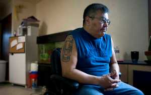 Wilson Nicklie Jr. reflects on his past alcohol dependence during an interview at his Juneau apartment in early May. Nicklie was recently filmed for a documentary for the Salvation Army.