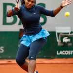 Serena Williams of the U.S. returns in her first round match of the French Open tennis tournament against Slovakia's Magdalena Rybarikova at the Roland Garros stadium in Paris, France, Tuesday, May 24, 2016. Williams won in two sets 6-2, 6-0. (AP Photo/Alastair Grant)