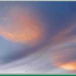 At sunset, storm clouds move in.