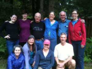 Rainforest Yoga past and present Board members. Bottom row from left to right; Jennifer Strumfeld, Bev Ingram, Evonne Reese, Obie Davis. Top row; Lindsey Kirchhoff, Heidi Lengdorfer, Steven Wolf, Kristine Benson, Glen Ray and Libby Stringer.