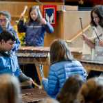 Juneau Community Charter School sixth- and seventh-grade students in the Monday marimba class with instructor Betsy Sims perform during the Moving On Ceremony for the fifth and eighth grade students at Northern Light United Church on Wednesday. Students Jorge Cordero and Alaura Dunlap are in front and Barilla Blatnick, left, Zach Cone, center, and Elsie Presson are in the back.