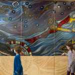 Sasha Morrison, 8, left, and her sister, Anita, 10, view a portion of artist Evon Zerbetz's glass dividing wall in the Father Andrew P. Kashevaroff State Library, Archives, and Museum. The children were taking part of a family day tour of the new facility. The building opens to the public on Monday, June 6.