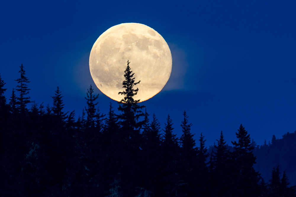 In this May 21 photo, the moonrise is shown over Auke Bay.