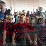 Students from Harborview Elementary School's Tlingit Culture Language and Literacy program cut the ribbon during the grand opening of the Andrew P. Kashevaroff State Library, Archives and Museum on Monday.