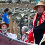 Gov. Bill Walker, left, smiles while taking part of the Coming Ashore Ceremony at Douglas Harbor on Wednesday.