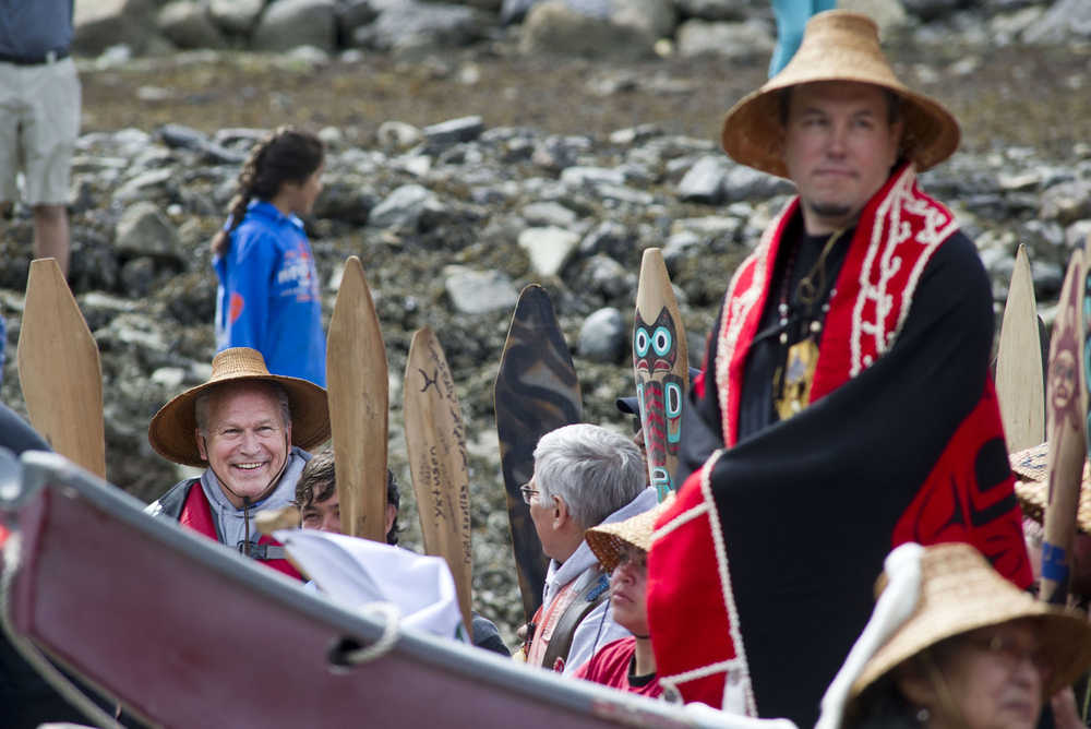 Gov. Bill Walker, left, smiles while taking part of the Coming Ashore Ceremony at Douglas Harbor on Wednesday.