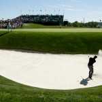 Rory McIlroy, of Northern Ireland, hits out of the bunker on the 17th hole during a practice round for the U.S. Open golf championship at Oakmont Country Club on Tuesday, June 14, 2016, in Oakmont, Pa. (AP Photo/Charlie Riedel)