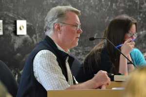 Murray Walsh, of Walsh PLanning and Development Services, speaks on behalf of Miller Construction Ltd. during the Planning Commission's Tuesday night meeting. The commission unanimously approved a conditional use permit, allowing Miller Construction to operate a temporary asphalt plant near the DMV in the Mendenhall Valley.