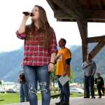 Elizabeth Bryson sings the national anthem Saturday, kicking off the first day of the 26th annual Gold Rush Days at Savikko Park where Southeast Alaska's mining and logging industries are celebrated with competitions, family activities and food.