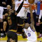 In this Sunday, June 19, 2016 photo, Cleveland Cavaliers forward LeBron James (23) blocks a shot by Golden State Warriors forward Andre Iguodala (9) during the second half of Game 7 of basketball's NBA Finals in Oakland, Calif. James had three blocked shots, including this key one against Iguodala on a fast break in the final minutes. The Cavaliers won 93-89. (AP Photo/Eric Risberg)