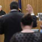 U.S. Magistrate Judge Leslie Longenbaugh swears in new citizens during a U.S. Naturalization Ceremony at the Robert Boochever U.S. Courthouse in the Federal Building on Friday. Forty-one people from 10 countries became U.S. citizens.