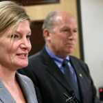 Jahna Lindemuth, left, is introduced Tuesday, June 28, 2016, in Anchorage, Alaska, as the state's new attorney general. Gov. Bill Walker, right, made the announcement at a news conference. (AP Photo/Mark Thiessen)
