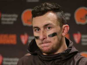 FILE - In this Dec. 20, 2015, file photo, Cleveland Browns quarterback Johnny Manziel speaks with media members following the team's 30-13 loss to the Seattle Seahawks in an NFL football game, in Seattle. Manziel has been suspended for the first four games of next season for violating the NFL's substance-abuse policy.The suspension announced Thursday, June 30, 2016, is not related to the NFL's domestic violence policy, but the free agent quarterback would be subject to it if he signs with another team. (AP Photo/Scott Eklund, File)