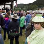 Sue Schrader attends Rev. Franklin Graham's prayer rally with a colander on her head at Savviko Park on Friday.