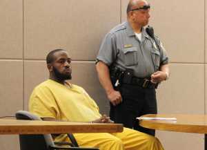 Laron Carlton Graham, 38, stares off in silence as a Judge Philip Pallenberg reads a jury's verdict on Friday, July 1, declaring him guilty of four felonies and nine misdemeanors.