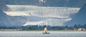 In this June 29 photo, a sailor spends some time in Fritz Cove with a backdrop of the Mendenhall Glacier. This year is on pace to be the warmest ever in Alaska.