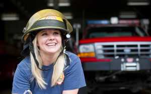 Kristi Asplund,a volunteer firefighter at the Douglas Station, lives at the station in exchange for maintaining ready status of equipment and driving the engine to fires.