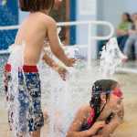 Shanir Blum, left, 3, splashes his sister, Royenn, 6, at the 6th Annual Rotary Day at the Pool at the Dimond Park Aquatic Center on Saturday afternoon. The pool held three free swims, with over 100 attendees at each swim. The swim was sponsored by the Glacier Valley Rotary Club, the Glacier Swim Club, and Juneau Parks and Recreation.