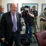 Gov. Bill Walker, center, walks into a Thursday press conference to show possible scenarios for Alaska economy if the Legislature fails to act during its special session. Following Walker are Lt. Gov. Byron Mallott and Revenue Department Commissioner Randy Hoffbeck.