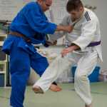 Cody Weldon, right, practices judo with instructor Luke Fortier at the Capital City Judo dojo on Tuesday.