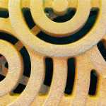 An iron street grate.