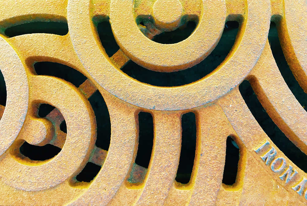 An iron street grate.