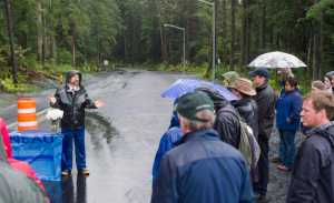 Lands and Resources Manager Greg Chaney speaks during a celebration of a new road to housing at the intersection of Jackie Street and Renninger Street, next to Dzantik'i Heeni Middle School, on Wednesday.