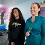 Amanda Falls and her daughter, Le'Neaha DeTienne, have been working together to paint the inside of a new daycare facility at Pavitt Health & Fitness in July.