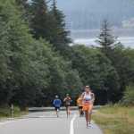 Cynthia Perkins climbs a hill near the halfway point of the Frank Maier Marathon on Saturday. Perkins was the fastest woman in the masters division.