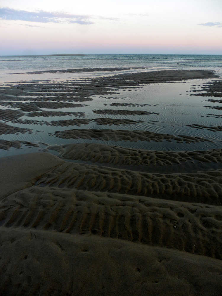 Tide and sand at Chatham Light Beach.