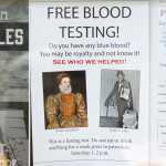 One of Jeff Brown's joke posters displayed along with event posters downtown on Tuesday.