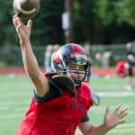 Quarterback Bubba Stults passes the ball during Juneau-Douglas High School varsity football practice at Adair-Kennedy Memorial Park on Wednesday.