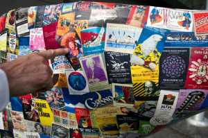 Bruce Simonson used 900 images of historical posters and memorabilia from over 50 arts organizations in Juneau to decorate the six-foot whale's tail. For construction of the sculpture, Simonson was assisted by Harry and Thomas James, Roald Simonson, and Gary Vetesy.  For the virtual rendering of the sculpture, he received help from Kurt Smith (for photography of the sculpture and construction of the mount), and from Finn Sinclair (for computer modeling and 3D rendering).