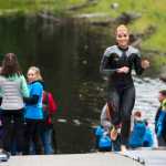 Kristin Jones exits Auke Lake during the 8th annual Aukeman Sprint Triathlon at the University of Alaska Southeast on Saturday.