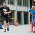 Derec Steinman receives some encouragement as he starts the run portion of the 8th annual Aukeman Sprint Triathlon at the University of Alaska Southeast on Saturday.