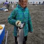 Carmen Farr with her first sockeye salmon, caught in a dipnet.