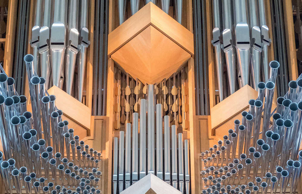 Symmetrical shapes on a pipe organ.