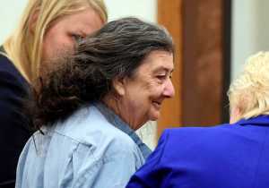 FILE - In this Sept. 8, 2014, file photo, Cathy Woods appears in Washoe District court in Reno, Nev. Woods, imprisoned for 35 years before being exonerated in a 1976 Reno murder case, is suing officials in Nevada and Louisiana on federal civil rights, malicious prosecution and conspiracy claims. (Andy Barron/The Reno Gazette-Journal via AP, File)