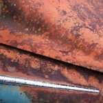 Rust never sleeps, but chrome never rusts.  Chrome still shines on a rusty car near the Tolch Rock Trail in August 2016.