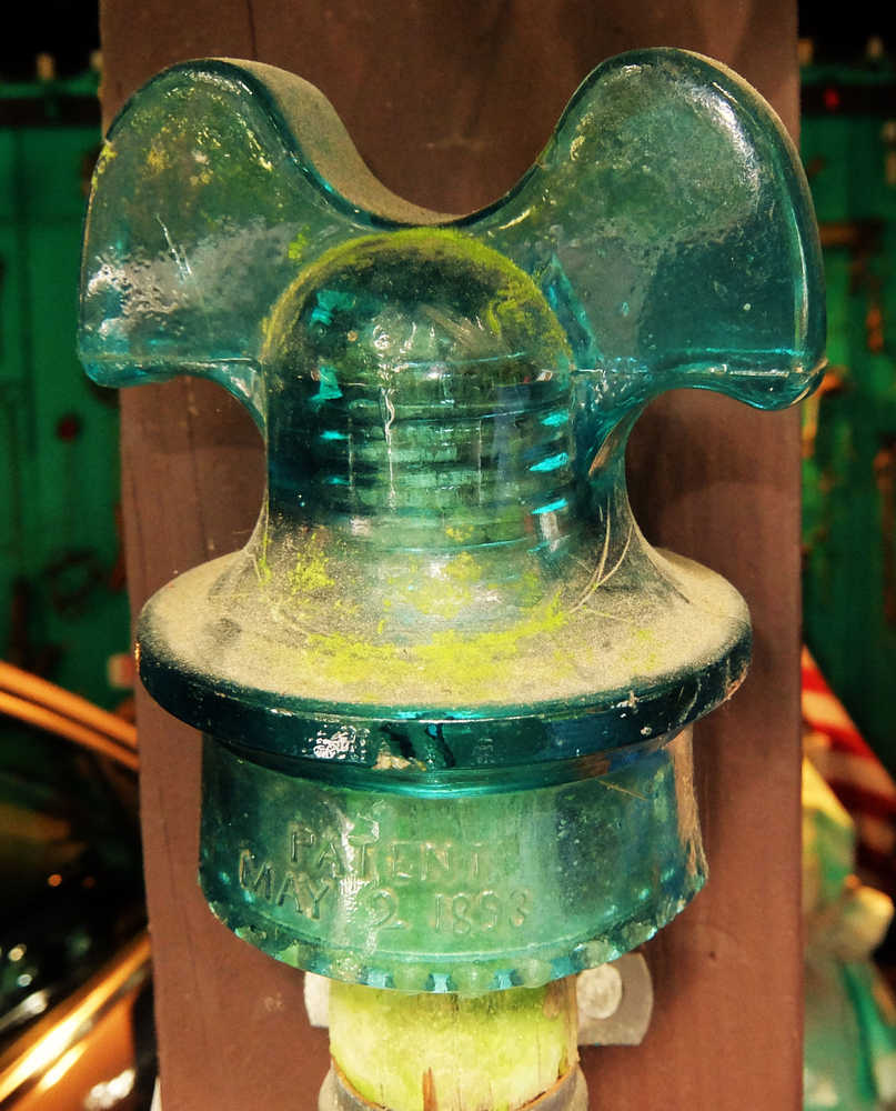 Insulator with Mickey Mouse ears.