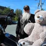 Panhandler Mark Pritchett and a new friend enjoy the Douglas sunshine. 2016 was the 22nd year for the annual Bob Valliant Toy Run. Douglas Volunteer Firefighters, Capital City Fire and Rescue, the Triangle Club and Louie's Bar supported the run. The Panhandlers Motorcycle Club rounded up hundreds of soft toys.