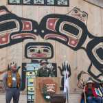 Glacier Bay National Park and Preserve superintendent Philip Hooge speaks on the long effort to establish the tribal house as Frank Wright, left, and clan leaders, right, listen. "The park is honored by the opportunity to be a part of this great dream," he said.  The partnership between the Hoonah Indian Association and the National Park Service earned the organizations a national award, given each year to only one partnership.