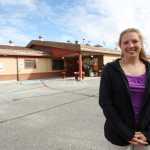 ADVANCE FOR WEEKEND EDITIONS, SEPT. 3-4 - In this Aug. 22, 2016 photo, Ariel Cunningham, the new manager of the Fairbanks North Star Borough Animal Shelter, poses outside the shelter in Fairbanks, Alaska. Growing up in Webster, N.H., in the 1990s, Cunningham had no brothers or sisters. Her playmates were her family's pets--thirteen dogs and five cats. (Eric Engman/Fairbanks Daily News-Miner via AP)