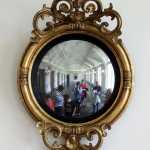 A mirror in the Daughters of the American Revolution (DAR) Hall Ballroom. These mirrors allowed those who gazed in them to see who was speaking to whom within the entire room. unobtrusively.