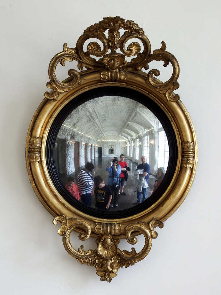 A mirror in the Daughters of the American Revolution (DAR) Hall Ballroom. These mirrors allowed those who gazed in them to see who was speaking to whom within the entire room. unobtrusively.