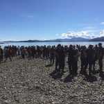 Visitors fill the beach to greet canoes arriving from Klawock, Kasaan, Ketchikan, and Juneau for the rededication of Náay í'Waans.