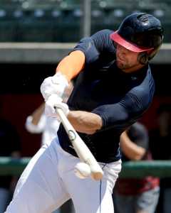 FILE - In this Aug. 30, 2016, file photo, former NFL quarterback Tim Tebow hits during batting practice for baseball scouts and the media in Los Angeles. Tebow has signed a minor league contract with the New York Mets. The Mets announced Thursday, Sept. 8, 2016,  that the former quarterback will take part in the Instructional League in Port St. Lucie, Florida. (AP Photo/Chris Carlson)